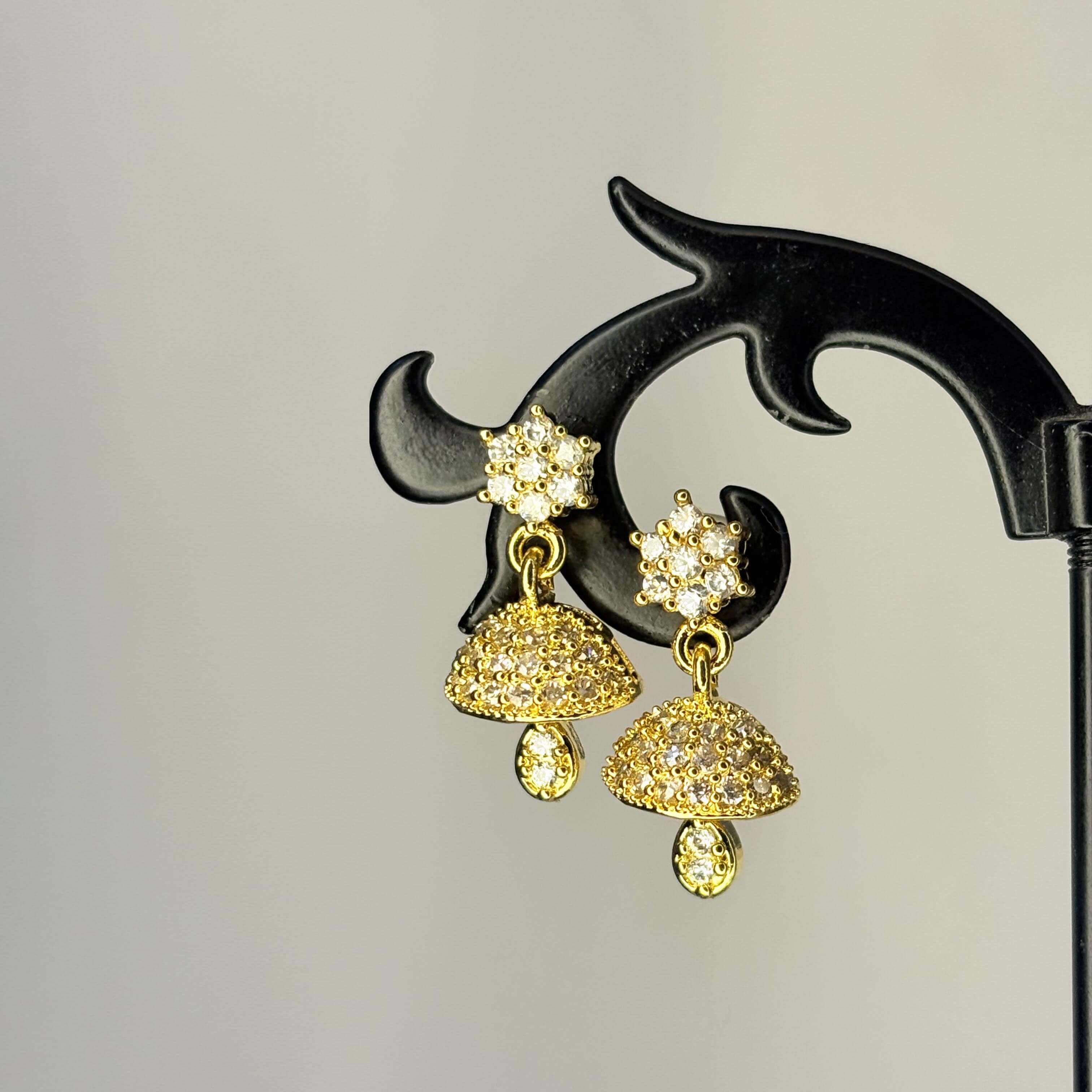 Golden AD Stone Star Jhumkas